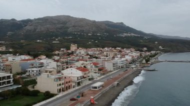 Aerial cityscape view of Neapolis town at sunset. Also named Vatika in Laconia, Greece. Neapoli is a famous coastal town built on the same site as the ancient Laconian city of Boeae