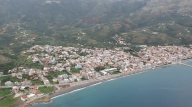 Aerial cityscape view of Neapolis town at sunset. Also named Vatika in Laconia, Greece. Neapoli is a famous coastal town built on the same site as the ancient Laconian city of Boeae