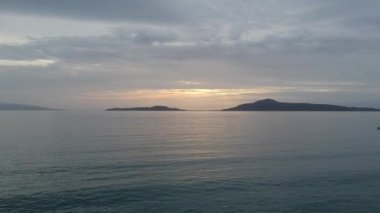 Aerial panoramic view of Elafonisos island over the Laconian gulf at sunset in Peloponnese, Greece, Europe.