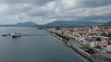 Aerial cityscape view of Neapolis town at sunset. Also named Vatika in Laconia, Greece. Neapoli is a famous coastal town built on the same site as the ancient Laconian city of Boeae