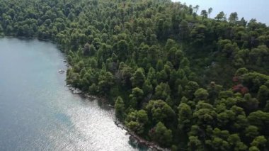 Amazing scenery over Skopelos island Greece in Autumn. Skopelos is the largest island of Sporades complex, covering 96 square km covered at 80% of its total extent from Pinewoods