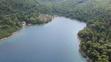 Amazing scenery over Skopelos island Greece in Autumn. Skopelos is the largest island of Sporades complex, covering 96 square km covered at 80% of its total extent from Pinewoods