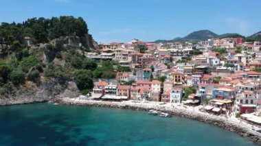 Aerial panoramic cityscape view of Parga city, Greece during the Summer. Beautiful architectural colorful buildings near the port of Parga Epirus, Greece, Europe