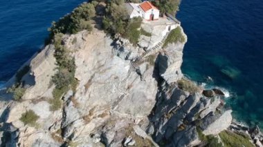Aerial view of the famous small church Agios Ioannis in Skopelos. Its located in the region of Kastri, about 7km east of Glossa, northern Skopelos Sporades Greece.