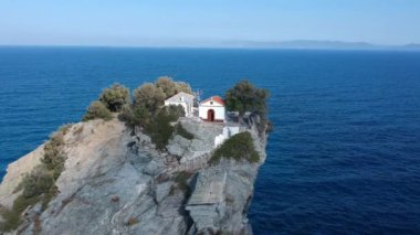 Aerial view of the famous small church Agios Ioannis in Skopelos. Its located in the region of Kastri, about 7km east of Glossa, northern Skopelos Sporades Greece.