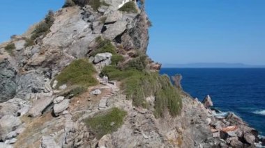 Aerial view of the famous small church Agios Ioannis in Skopelos. Its located in the region of Kastri, about 7km east of Glossa, northern Skopelos Sporades Greece.