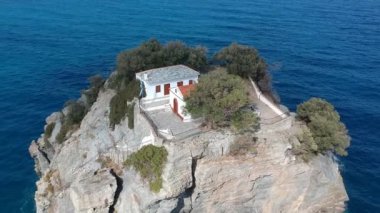 Aerial view of the famous small church Agios Ioannis in Skopelos. Its located in the region of Kastri, about 7km east of Glossa, northern Skopelos Sporades Greece.