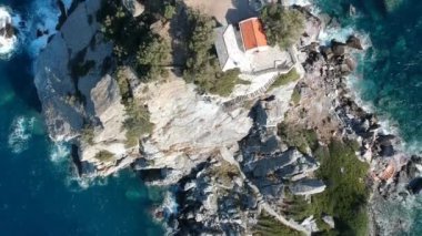 Aerial view of the famous small church Agios Ioannis in Skopelos. Its located in the region of Kastri, about 7km east of Glossa, northern Skopelos Sporades Greece.