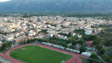 Aerial video over soccer stadium of Sparti city in Lakonia, Greece