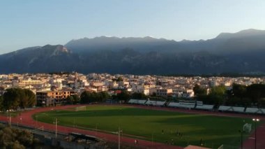 Aerial video over soccer stadium of Sparti city in Lakonia, Greece