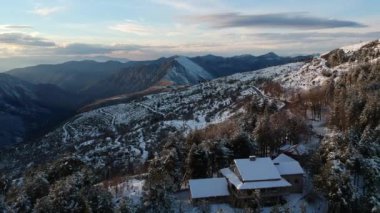 Aerial view of the snowy mountain Taygetus (also known as Taugetus or Taygetos) above Messenia unit in Peloponnese, Greece. Amazing natural scenery of the highest mountain in Peloponnese during winter