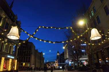 Streets of Oslo city covered with snow during winter period. Urban view of Oslo, Norway.