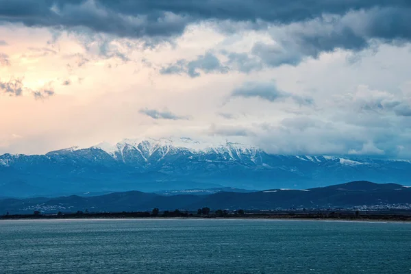 View of the impressive snowy mount Taygetus from Lakonia, Greece, Europe