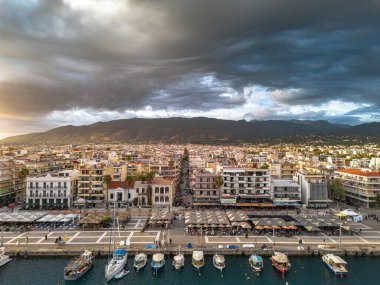 Aerial iconic sunset view over the port of Kalamata seaside city in Messenia, Greece. clipart