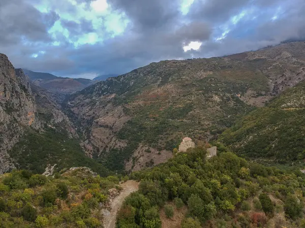 stock image Aerial scenic view from over the famous Ridomo gorge in Taygetus Mountain. The Gorge is deep and rich in geomorphological formation elements located near Kentro Avia and Pigadia Villages in Mani area, Messenia, Greece