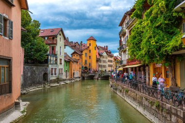 Beautiful urban scenery with colorful buildings in the old town of Annecy, Haute Savoie, in France. clipart