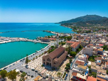 ZAKYNTHOS, GREECE - JUNE 20 2024: Aerial panoramic view over Zakynthos city against a beautiful blue Summer sky. Zakynthos island, Ionian sea in western Greece clipart