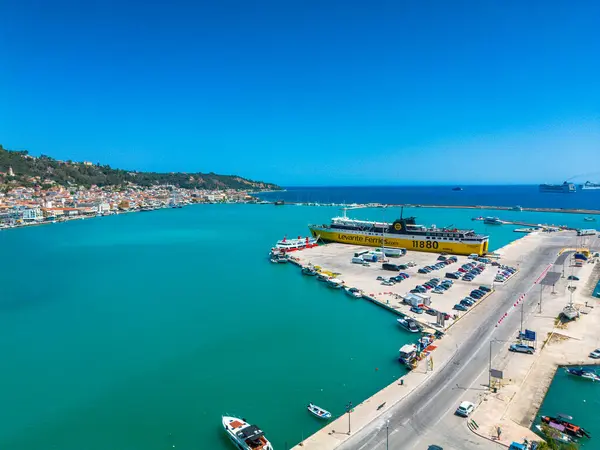 stock image ZAKYNTHOS, GREECE - JUNE 20 2024: Aerial panoramic view over Zakynthos city against a beautiful blue Summer sky. Zakynthos island, Ionian sea in western Greece