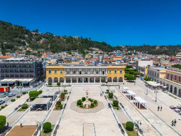 stock image ZAKYNTHOS, GREECE - JUNE 20 2024: Aerial panoramic view over Zakynthos city against a beautiful blue Summer sky. Zakynthos island, Ionian sea in western Greece