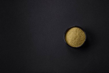 Spice dried dill or basil in the form of green powder. Asian cuisine