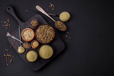 Spice dried dill or basil in the form of green powder. Asian cuisine