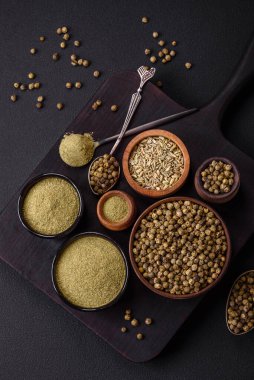 Spice dried dill or basil in the form of green powder. Asian cuisine