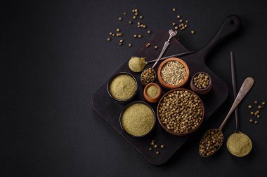 Spice dried dill or basil in the form of green powder. Asian cuisine