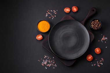 Delicious crispy toast or bruschetta with fried onion, champignon mushrooms and cheese with spices and herbs on a dark concrete background