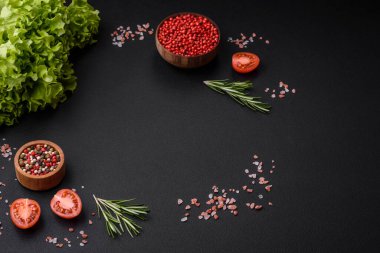 Delicious baked pork or chicken roll with mushrooms, spices and herbs inside on a dark concrete background