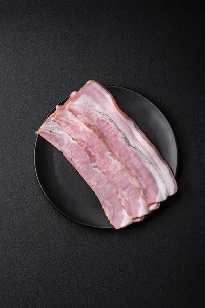 Delicious Fresh Bacon Stripes Spices Salt Dark Concrete Background — Stock Photo, Image