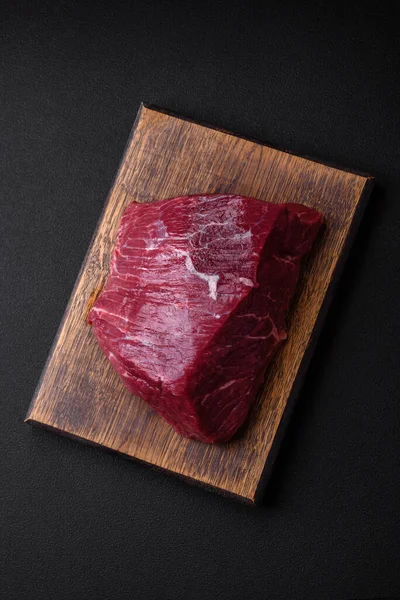 Piece Fresh Raw Beef Salt Spices Herbs Wooden Cutting Board — Stock Photo, Image