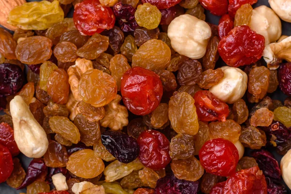 Mix Roasted Cashews Hazelnuts Walnuts Dried Cranberries Raisins Dark Concrete — Stock Photo, Image