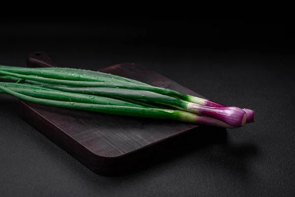 Fresh Green Onions Cooking Healthy Vegetarian Dish Dark Concrete Background — Stock Photo, Image
