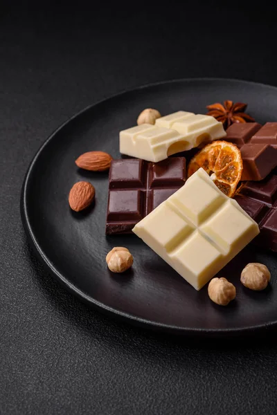 Mix Several Types Delicious Sweet Chocolate Broken Cubes Black Plate — Stock Photo, Image