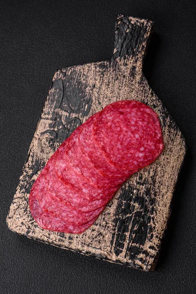 Delicious Smoked Salami Sausage Salt Spices Herbs Cut Slices Dark — Stock Photo, Image