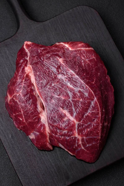 Fresh Raw Beef Steak Salt Spices Herbs Dark Concrete Background — Stock Photo, Image