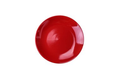 Koyu desenli beton arka planda boş seramik plaka. Mutfak masasındaki çatal bıçak takımı.