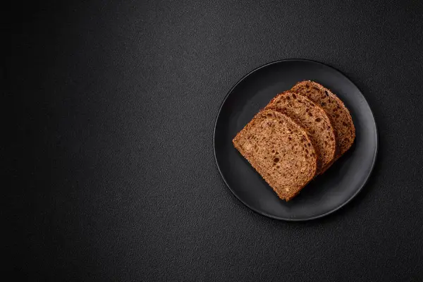 Delicious Fresh Crispy Brown Bread Grains Seeds Dark Concrete Background — Stock Photo, Image