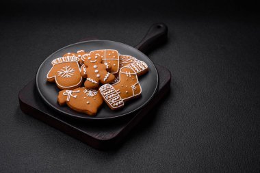 Delicious gingerbread cookies with honey, ginger and cinnamon. Winter composition