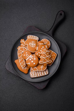 Delicious gingerbread cookies with honey, ginger and cinnamon. Winter composition