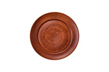 Dökümlü beton zemin üzerinde şişkin boş seramik bir tabak. Mutfak aletleri