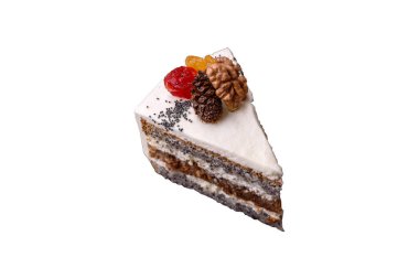 Delicious beautiful piece of cake with cream and berries on a black ceramic plate on a dark concrete background
