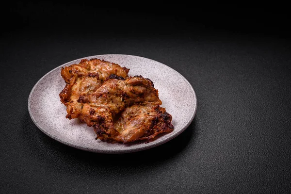 Delicious fresh crispy chicken grilled with salt, spices and herbs. Grilled meat dish