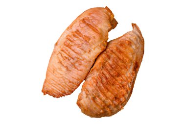 Lezzetli taze ızgara tavuk filetosu, esrarlı baharatlar ve çimento kaplı otlar. Ateşte pişirilmiş bir tabak.