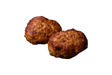 Lezzetli taze kıymalı balık pirzolası. Esmer arka planda baharatlar ve otlarla birlikte.