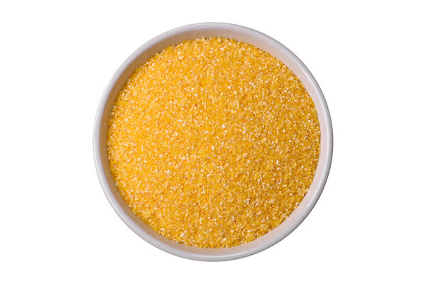 Corn grains or particles are yellow in color when raw. Cooking delicious nutritious porridge