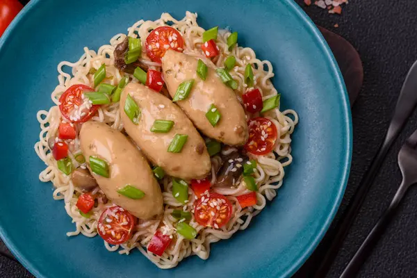 stock image Fish or meat quenelles with vegetables, salt and spices in mushroom sauce on a dark concrete background