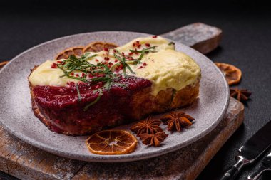 Delicious sweet brioche sandwich with raspberry jam and ricotta cream on a dark concrete background clipart