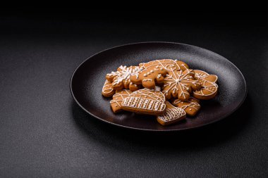 Delicious gingerbread cookies with honey, ginger and cinnamon. Winter composition