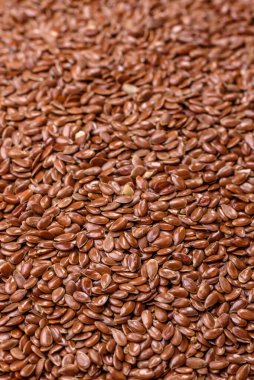 Bir kasede keten tohumu, vejetaryen ya da vejetaryen yemeği yapmak için bir malzeme. Lezzetli ve sağlıklı yemekler.